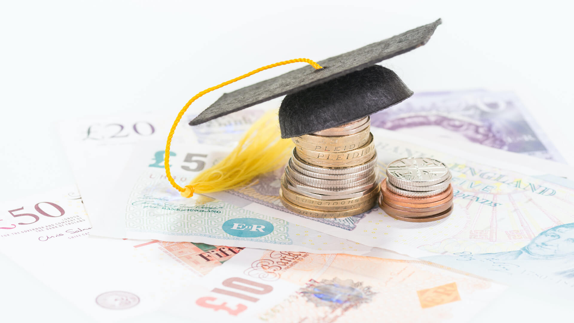 Mortar board on british pounds