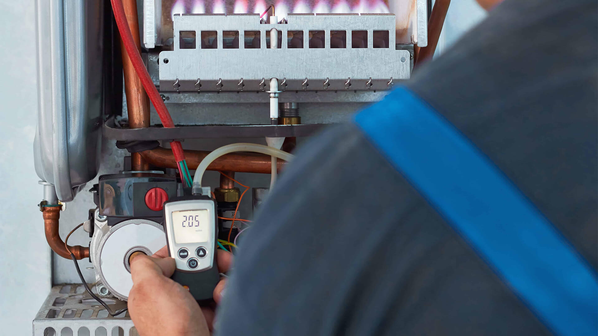 Man fixing a boiler