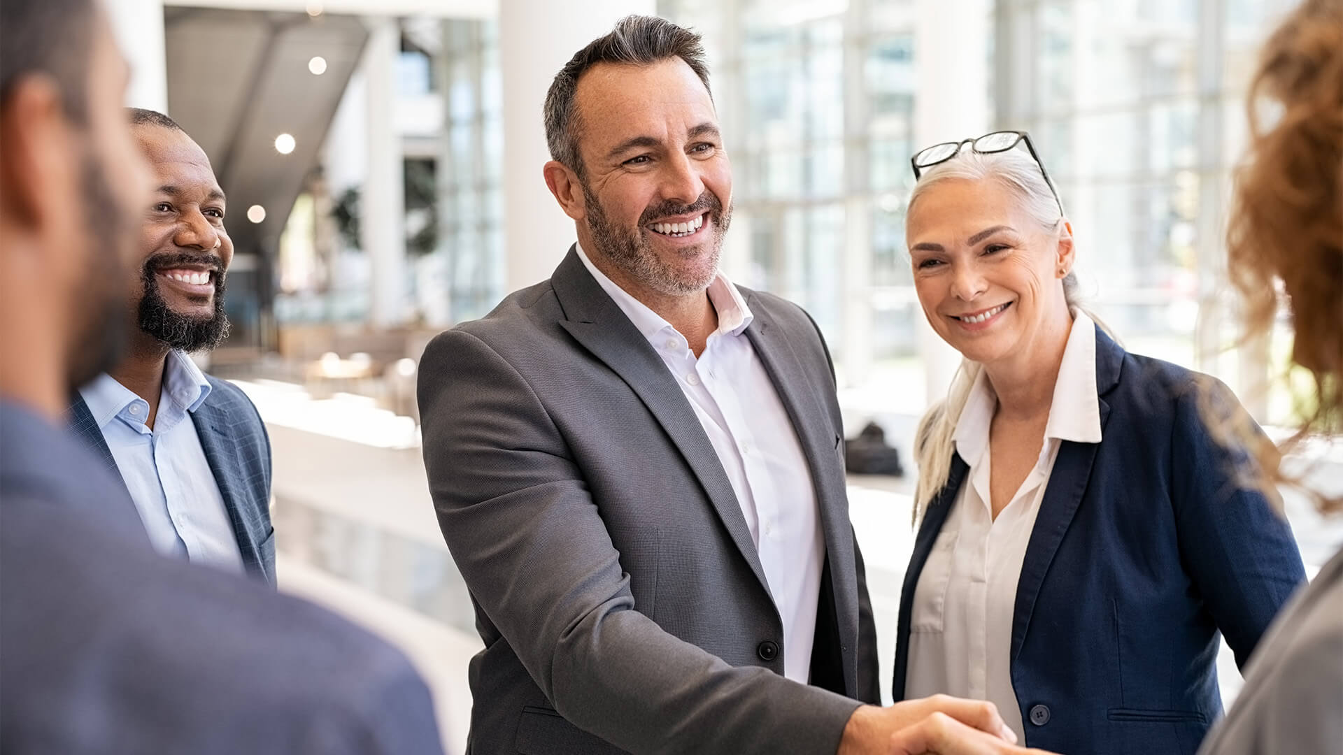 Business people shaking hands in meeting