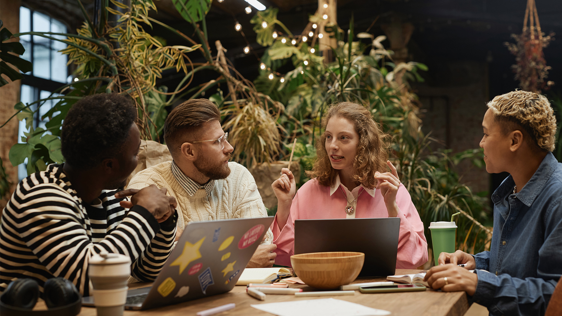 Gen Z in the workplace. Laptops.